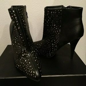 Black and gold booties